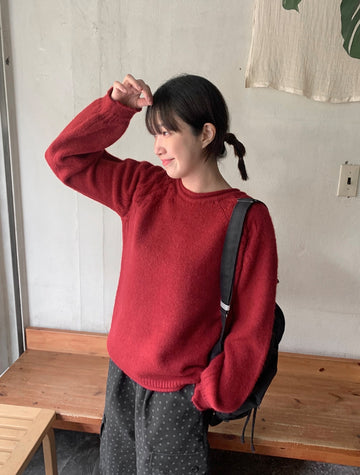 Habibi round neck cable over knit